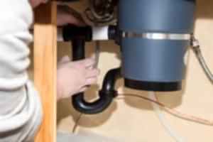 Image presents How can you troubleshoot a humming garbage disposal